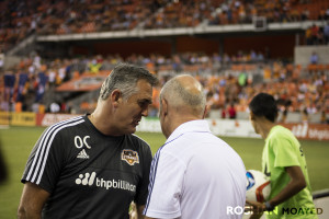 Current manager Owen Coyle exchanging courtesies with former manager Dominic Kinnear