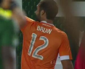 Will Bruin celebrating his goal in front of the Timbers Army
